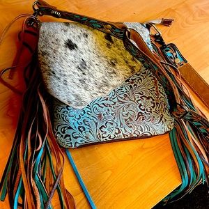 Concealed carry cowhide fringe purse